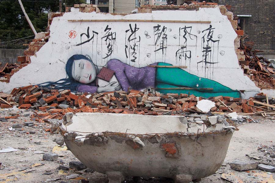 Pintura de Julien Seth Malland en una pared en una aldea del pueblo Fengjing en el distrito Jinshan de Shanghai. [Foto/Xinhua] 