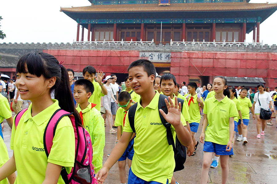 Niños criados familiares en zonas remotas visitan Pekín