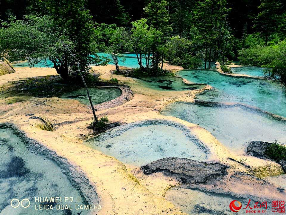Área Escénica de Huanglong: La piscina de Jade