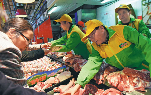 El “carnicero de la Universidad de Beijing” reinicia negocio de carne de cerdo después de 12 años como funcionario público