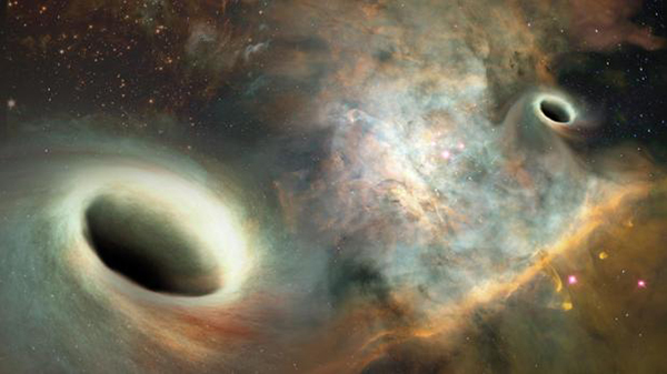 Captan por primera vez el abrazo cósmico de dos gigantescos agujeros negros