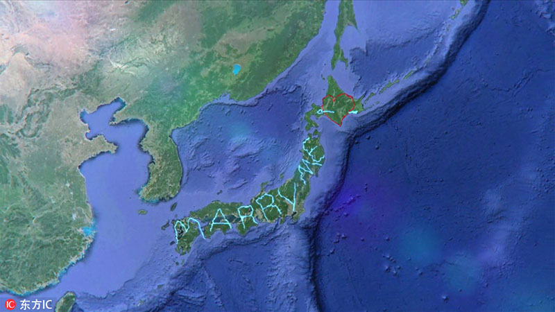 El artista de Tokio Yassan renunció a su trabajo y se puso a conducir para pasar medio año conduciendo por Japón y registrar la palabra "Marry Me" con la ruta del GPS y un corazón con flecha al final de su trayecto, utilizando el país como lienzo, el 10 de diciembre de 2014. [Foto / IC]