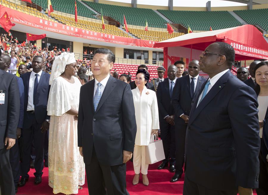 Xi asiste a ceremonia de entrega de arena nacional de lucha libre de Senegal