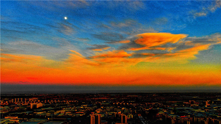 Fotografía de un espléndido atardecer invernal en Yinchuan, en la región autónoma Hui de Ningxia. [Foto por Su Yong/para chinadaily.com.cn]