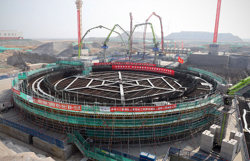 La foto tomada el 19 de mayo del 2021 muestra la ceremonia de lanzamiento de la construcción de la Unidad 3 de la planta de energía nuclear Xudapu en la ciudad Huludao, provincia de Liaoning, el mayor proyecto de cooperación en energía nuclear China-Rusia. [Foto: Xinhua]