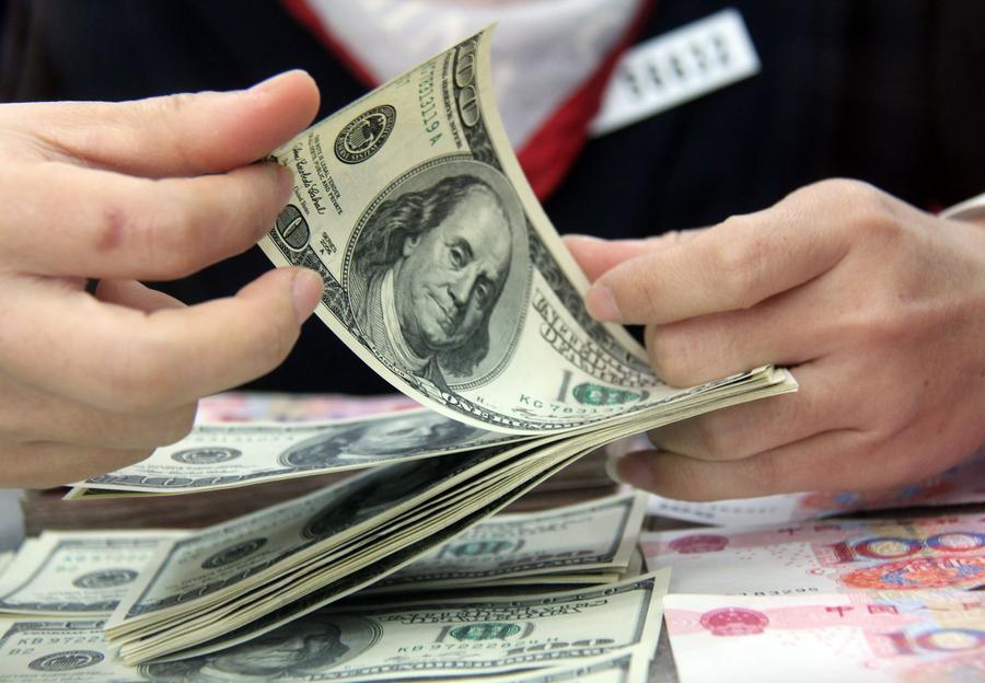Reservas de divisas de China caen a 3,2193 billones de dólares
