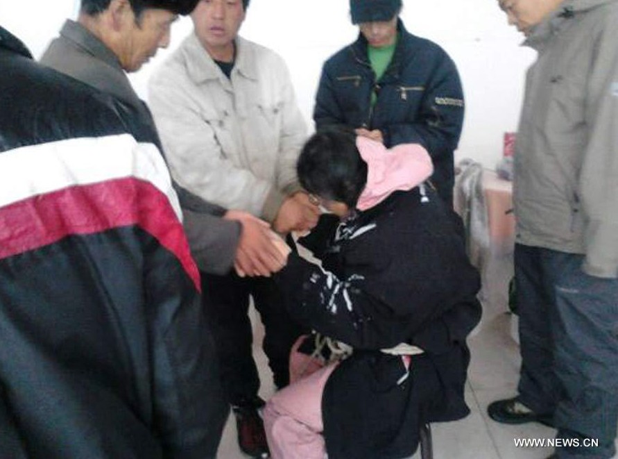 Dos supervivientes de la tormenta en Gran Muralla reciben tratamiento en norte de China