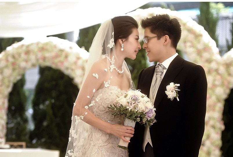 Campeona olímpica Guo Jingjing se casa con el hijo mayor del magnate de Hong Kong Timothy Fok