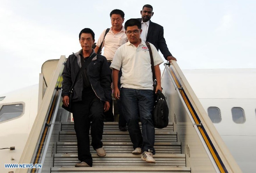Trabajadores chinos liberados llegan a capital de Sudán