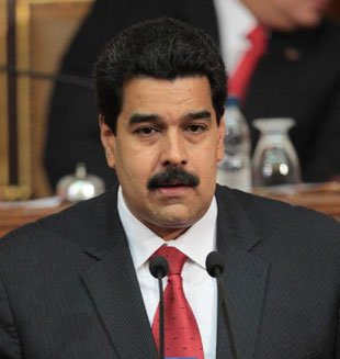 Presidente Chávez dice estar optimista y aferrado a la vida, afirma Maduro