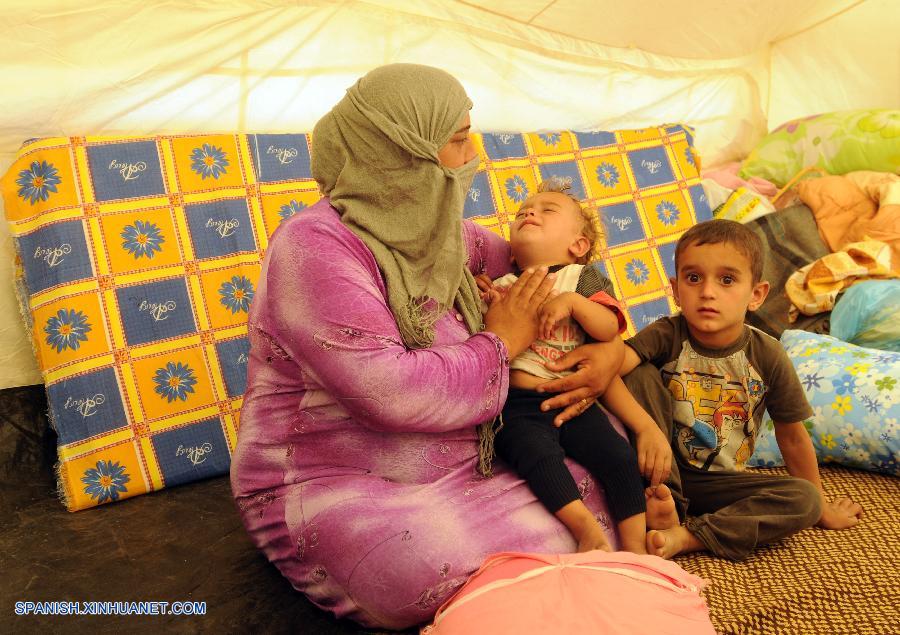 ONU transporta por aire ayuda a niños refugiados sirios en norte de Irak