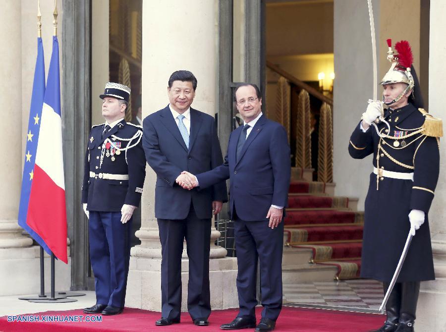 Presidentes de China y Francia conversan en París