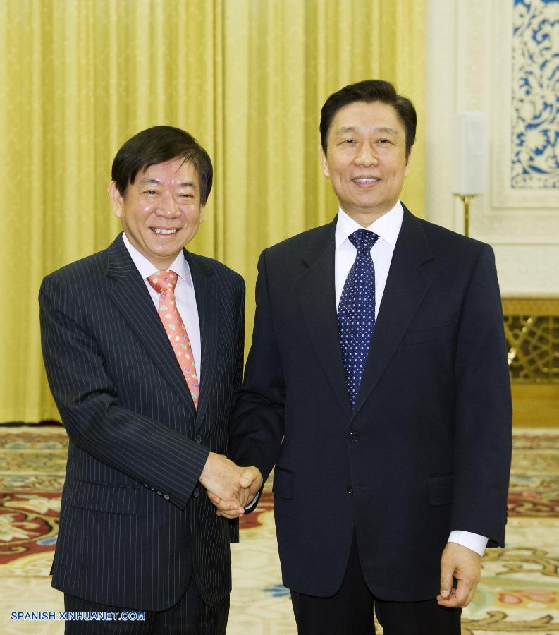 Vicepresidente chino se reúne con delegación de Singapur