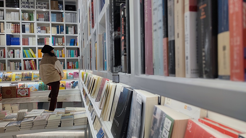La venta de libros aumenta la confianza en la ciudad afectada por las inundaciones en el norte de China